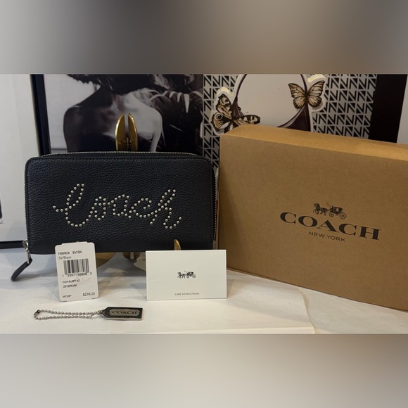 Coach Handbags - NWT COACH LIMITED EDITION STUDDED SCRIPT ZIPPER WALLET
7.5" (L) × 4" (H)